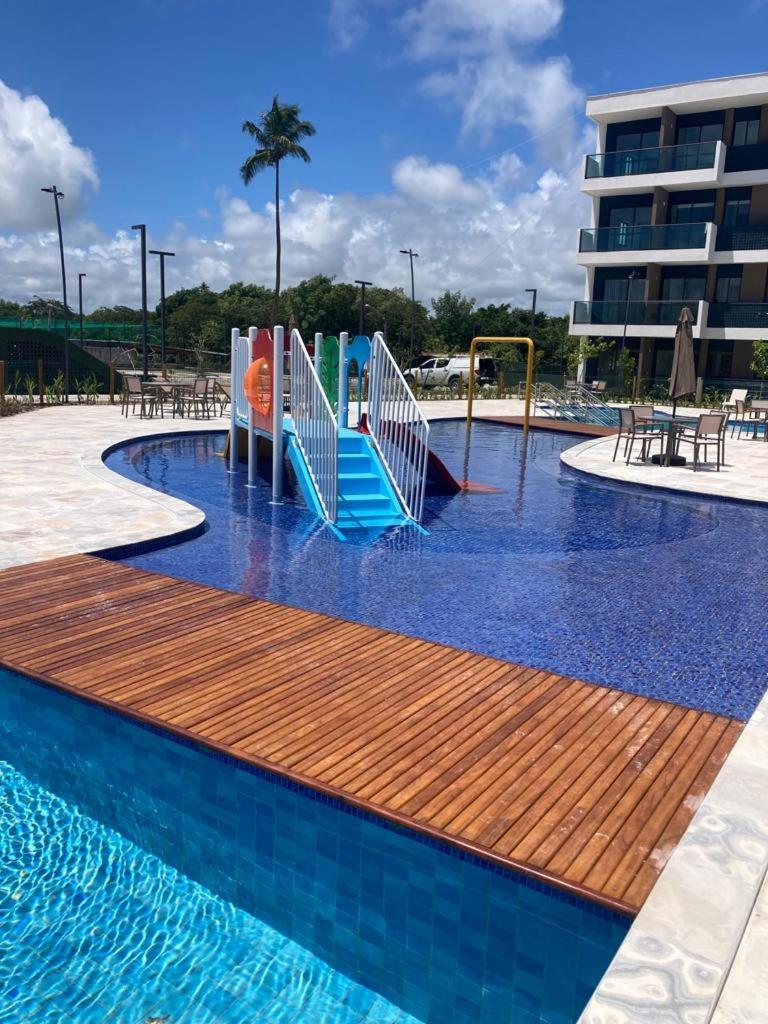 Resort em Porto de Galinhas- Flat Térreo Frente Piscinas- Muro Alto-B18