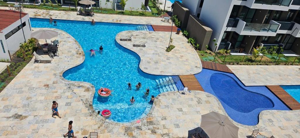 Resort em Porto de Galinhas- Flat Térreo Frente Piscinas- Muro Alto-B18