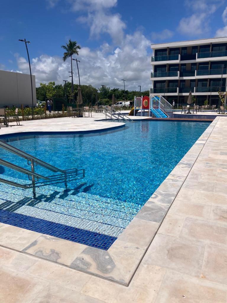 Resort em Porto de Galinhas- Flat Térreo Frente Piscinas- Muro Alto-B18