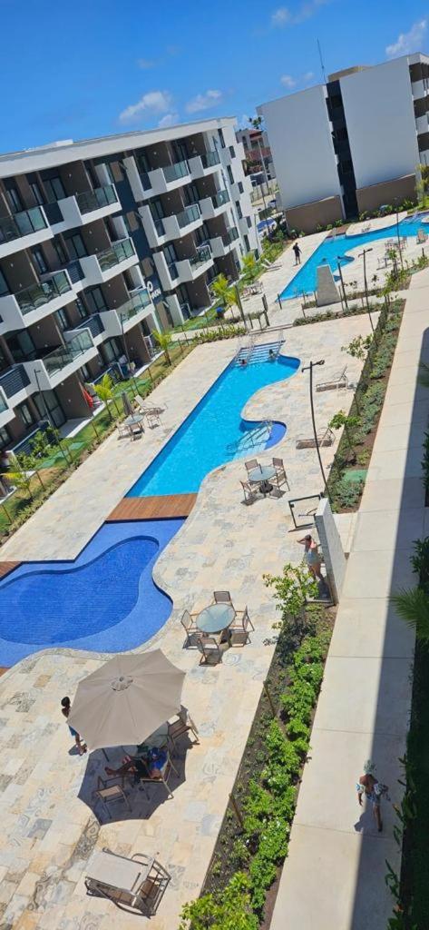 Resort em Porto de Galinhas- Flat Térreo Frente Piscinas- Muro Alto-B18