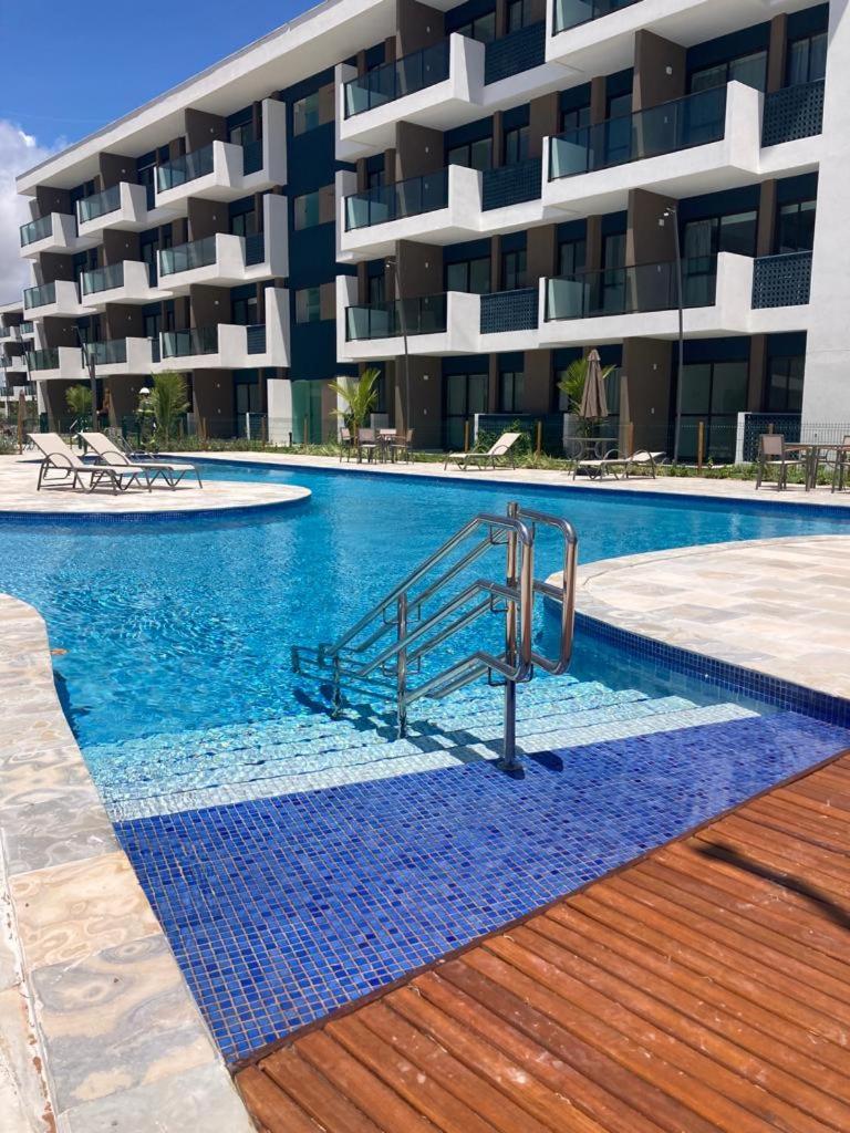 Resort em Porto de Galinhas- Flat Térreo Frente Piscinas- Muro Alto-B18
