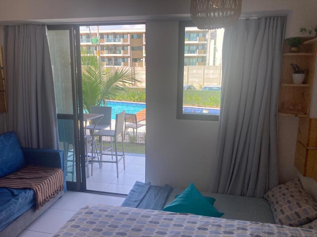 Resort em Porto de Galinhas- Flat Térreo Frente Piscinas- Muro Alto-B18