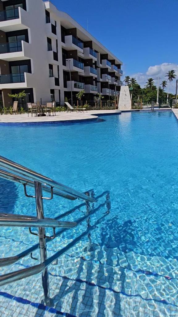 Resort em Porto de Galinhas- Flat Térreo Frente Piscinas- Muro Alto-B18