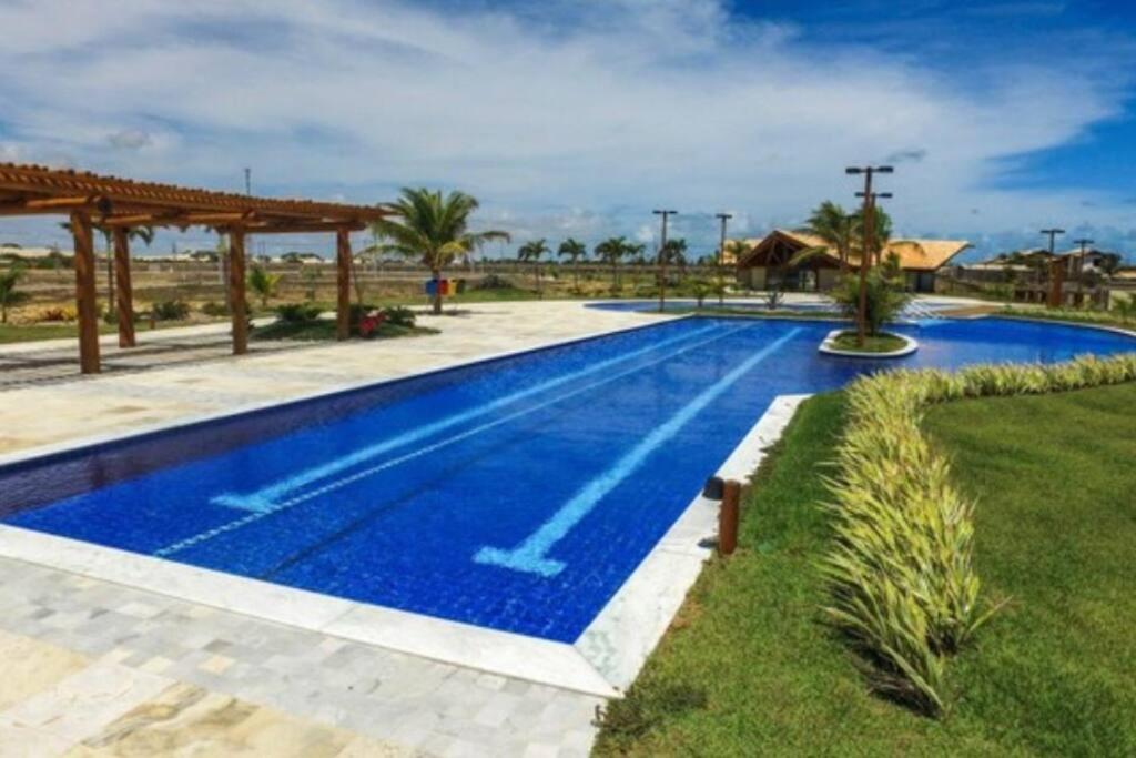 Paraíso beira mar condomínio 4 quartos Natal