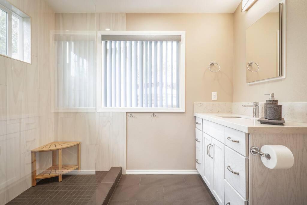 Serene Modern Escape with fireplace and outdoor shower view 3