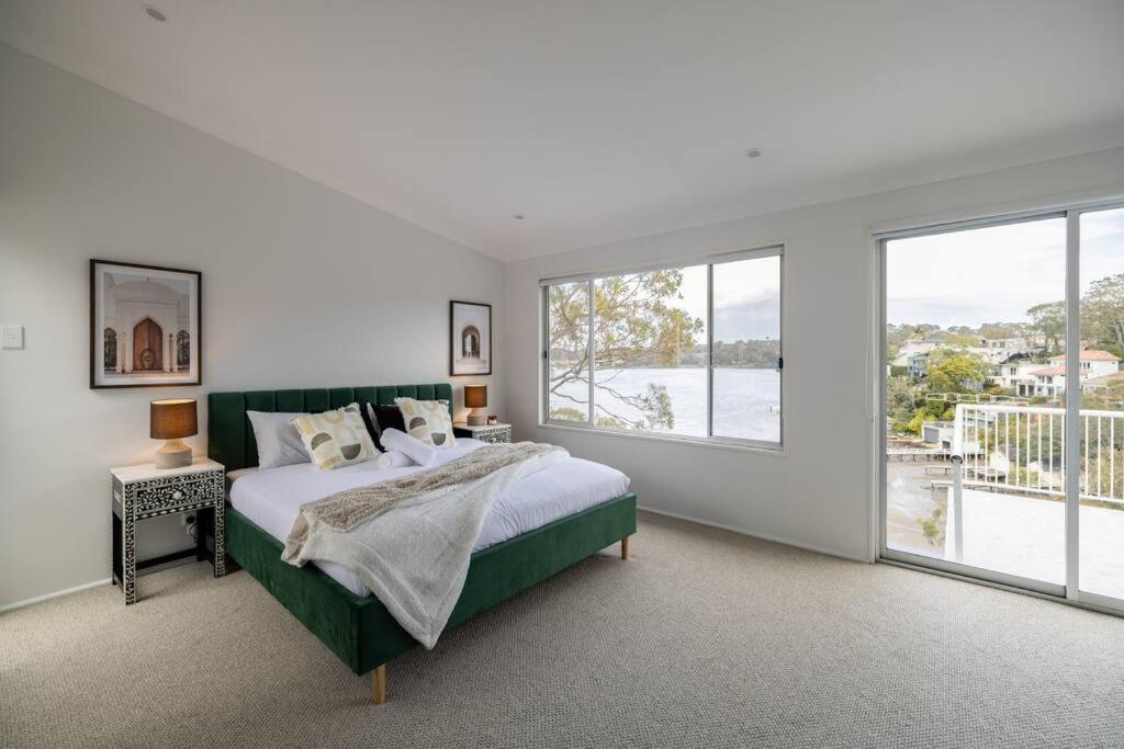 Luxurious Waterfront Retreat with Tennis Court
