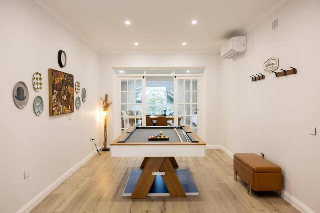 Luxurious Waterfront Retreat with Tennis Court