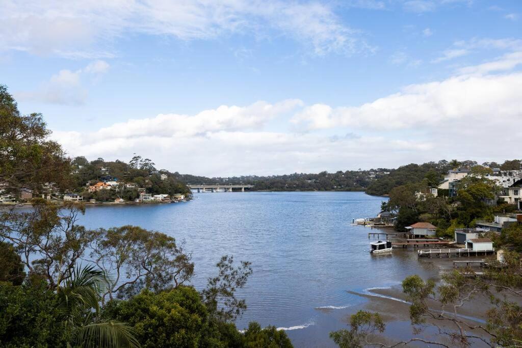 Luxurious Waterfront Retreat with Tennis Court