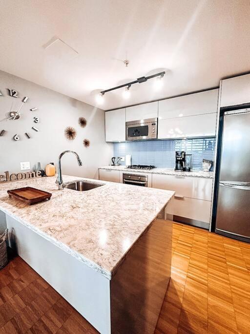 Water Views, Sub-Penthouse! Entire condo in Downtown Vancouver