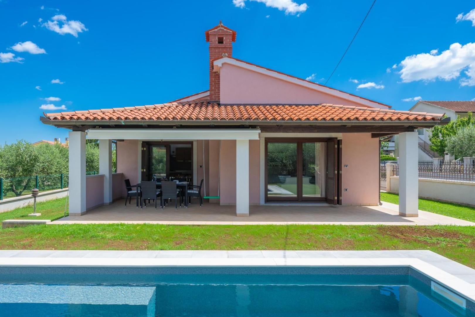 Olive tree oasis with heated pool view 4