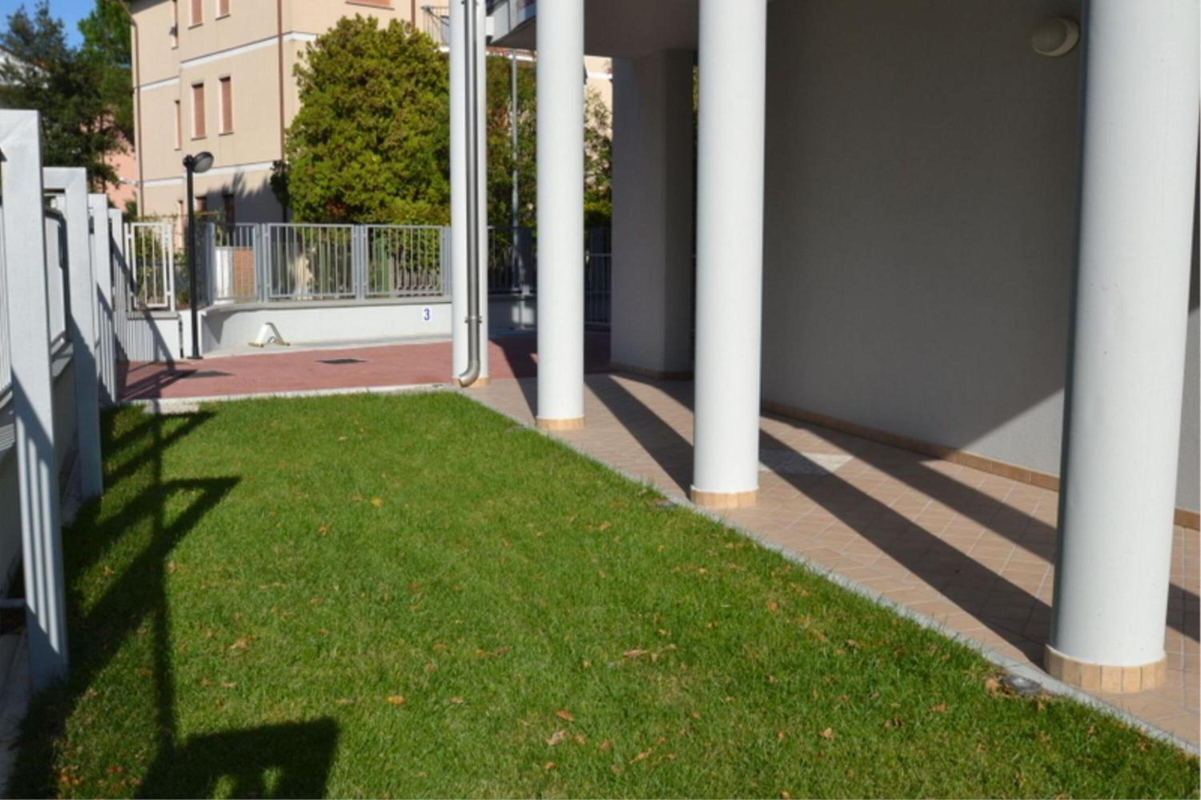 Bright apartment surrounded by greenery photo 5