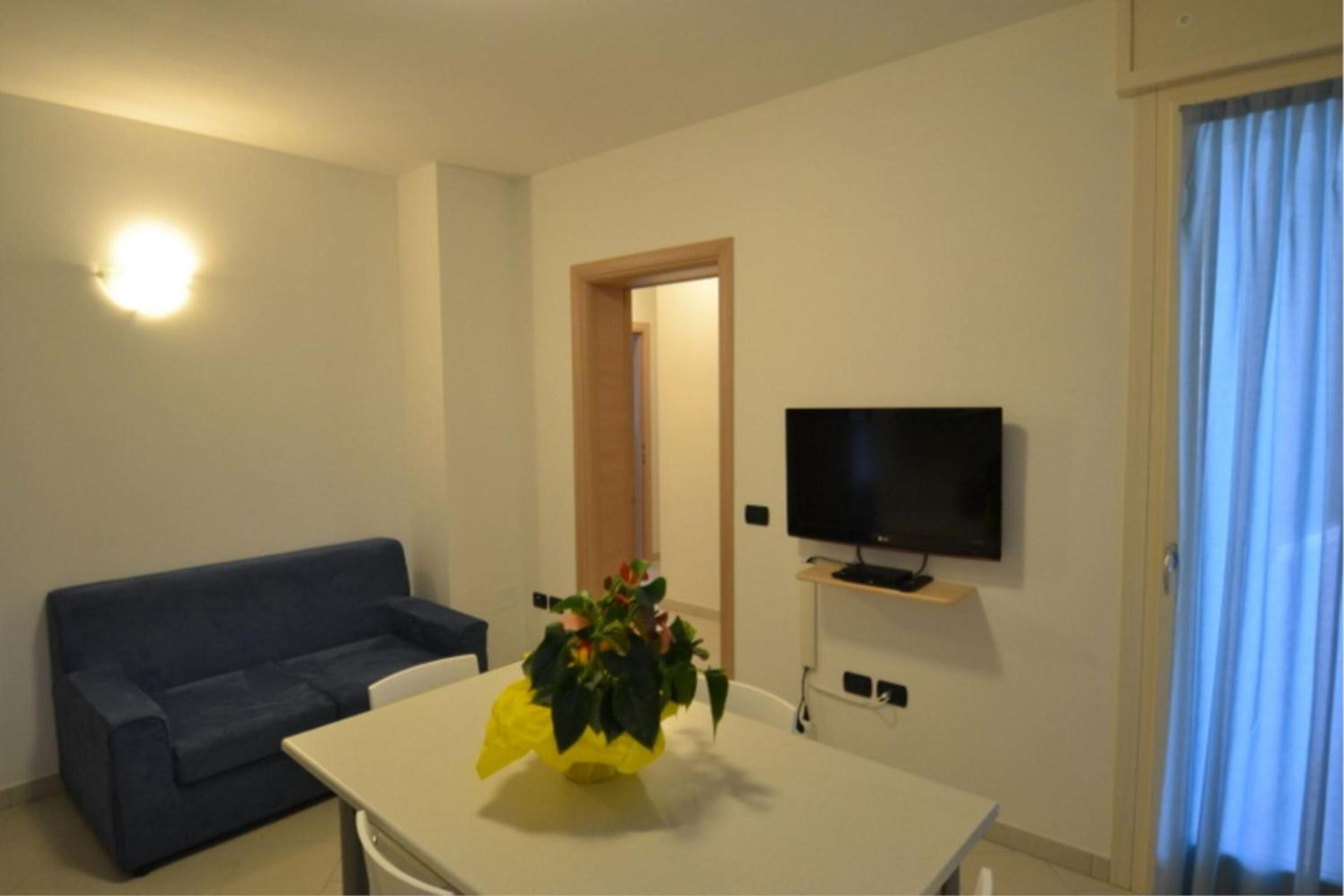 Bright apartment surrounded by greenery photo 4