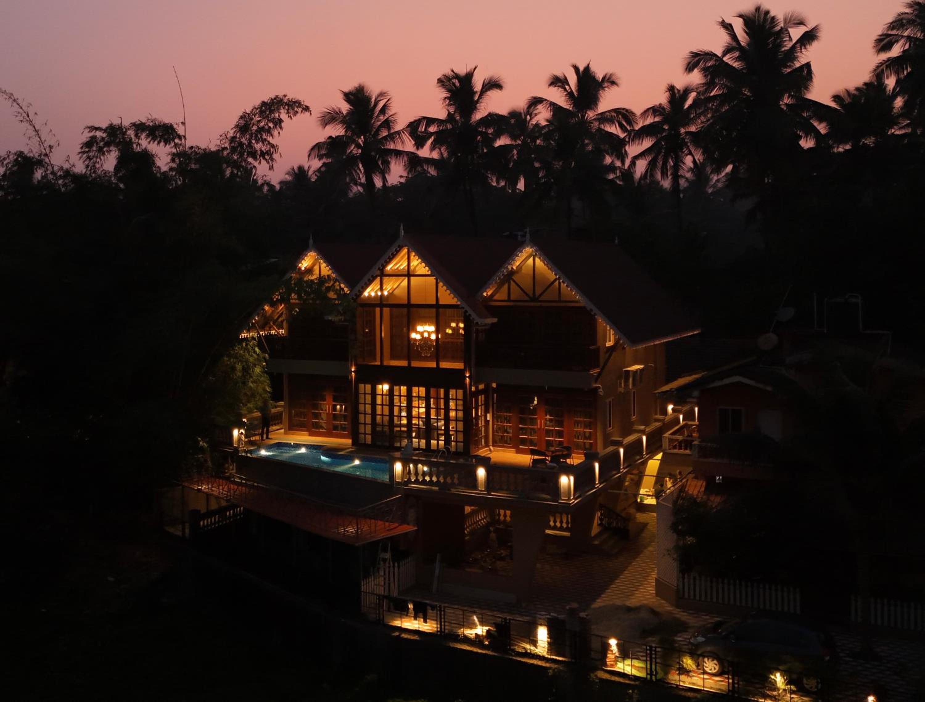 SaffronStays Tudor San Ann - 5BR Candolim villa with infinity pool, lift & sunrise-view rooms near beach