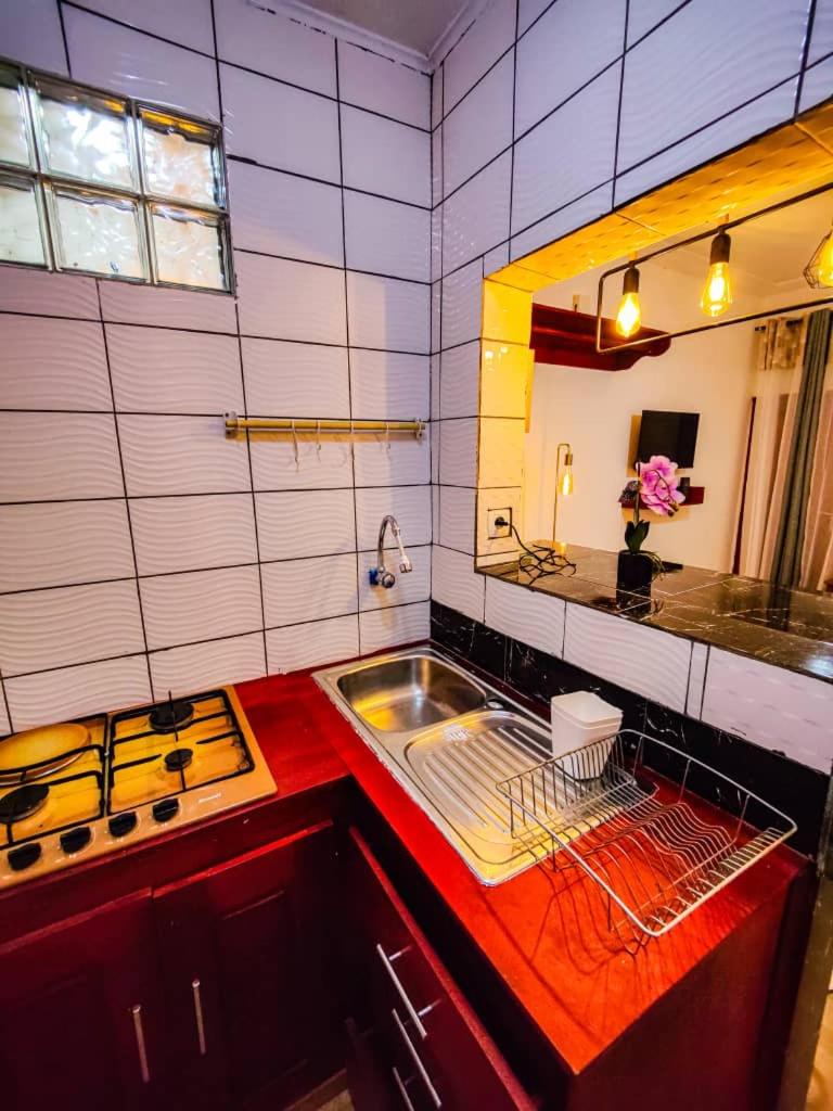 Dom City appartement et chambres meublés Yassa Douala