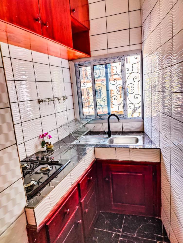 Dom City appartement et chambres meublés Yassa Douala