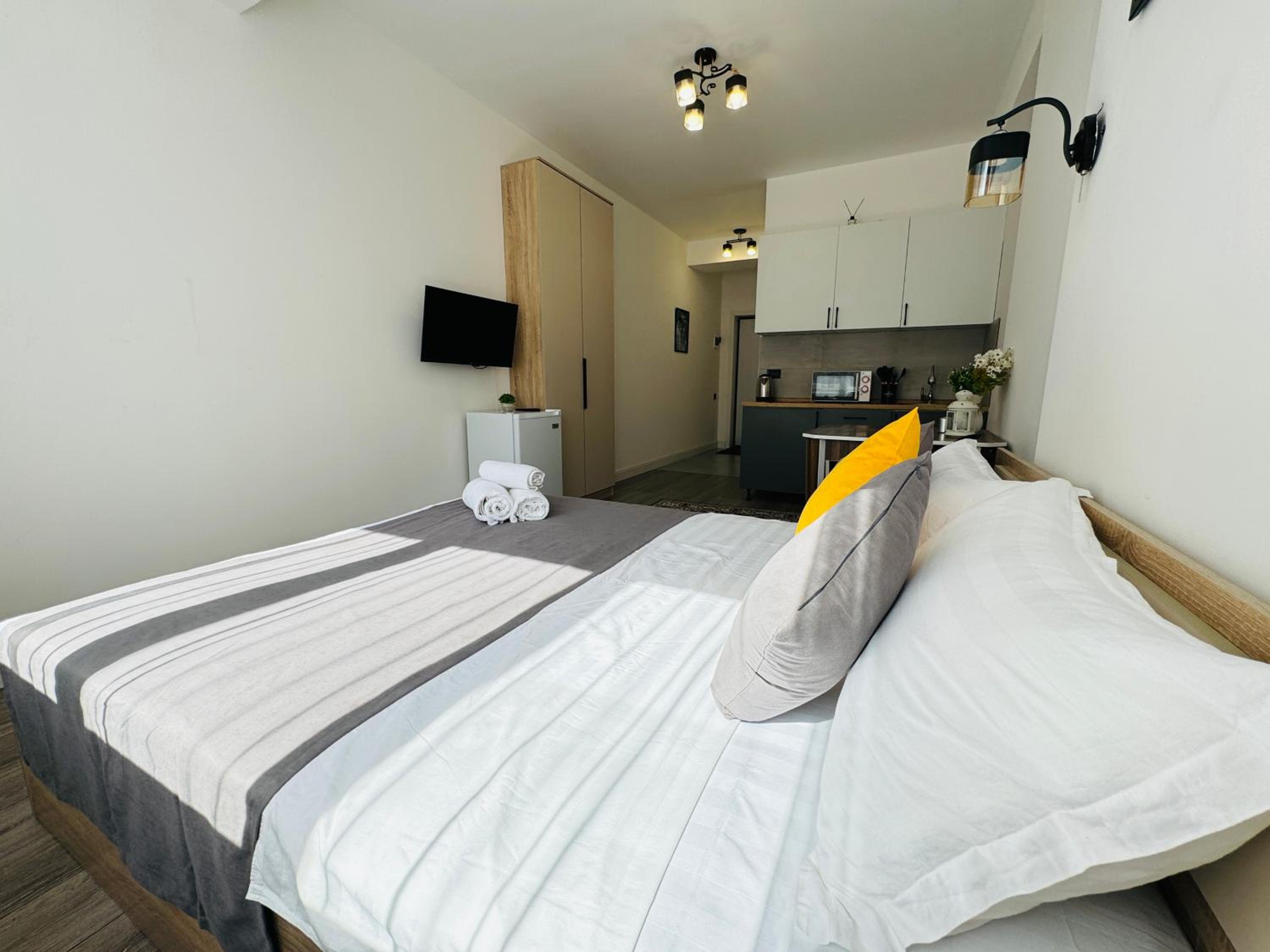 417I1 Gray and Yellow apartment Sholpan city