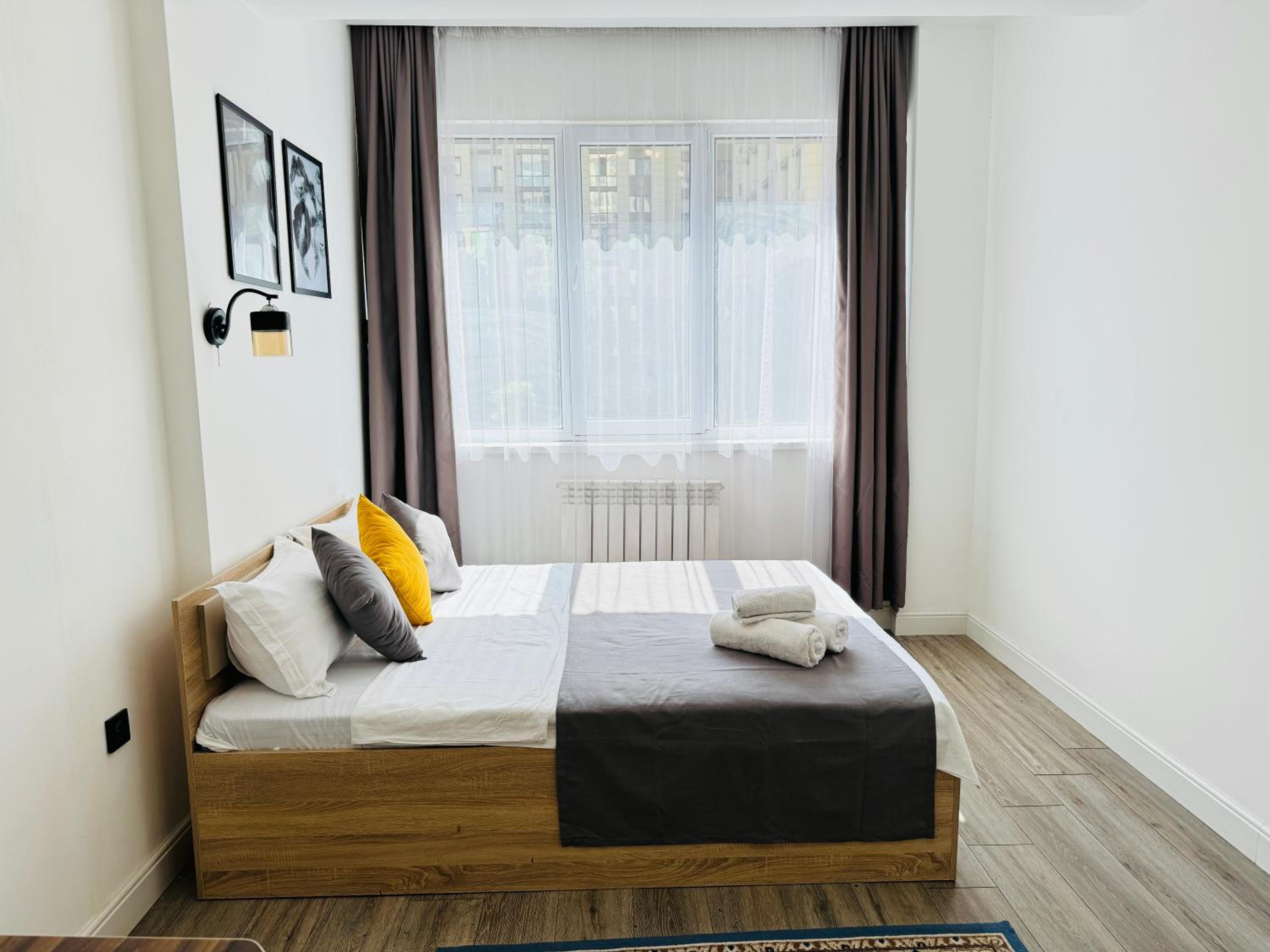 417I1 Gray and Yellow apartment Sholpan city