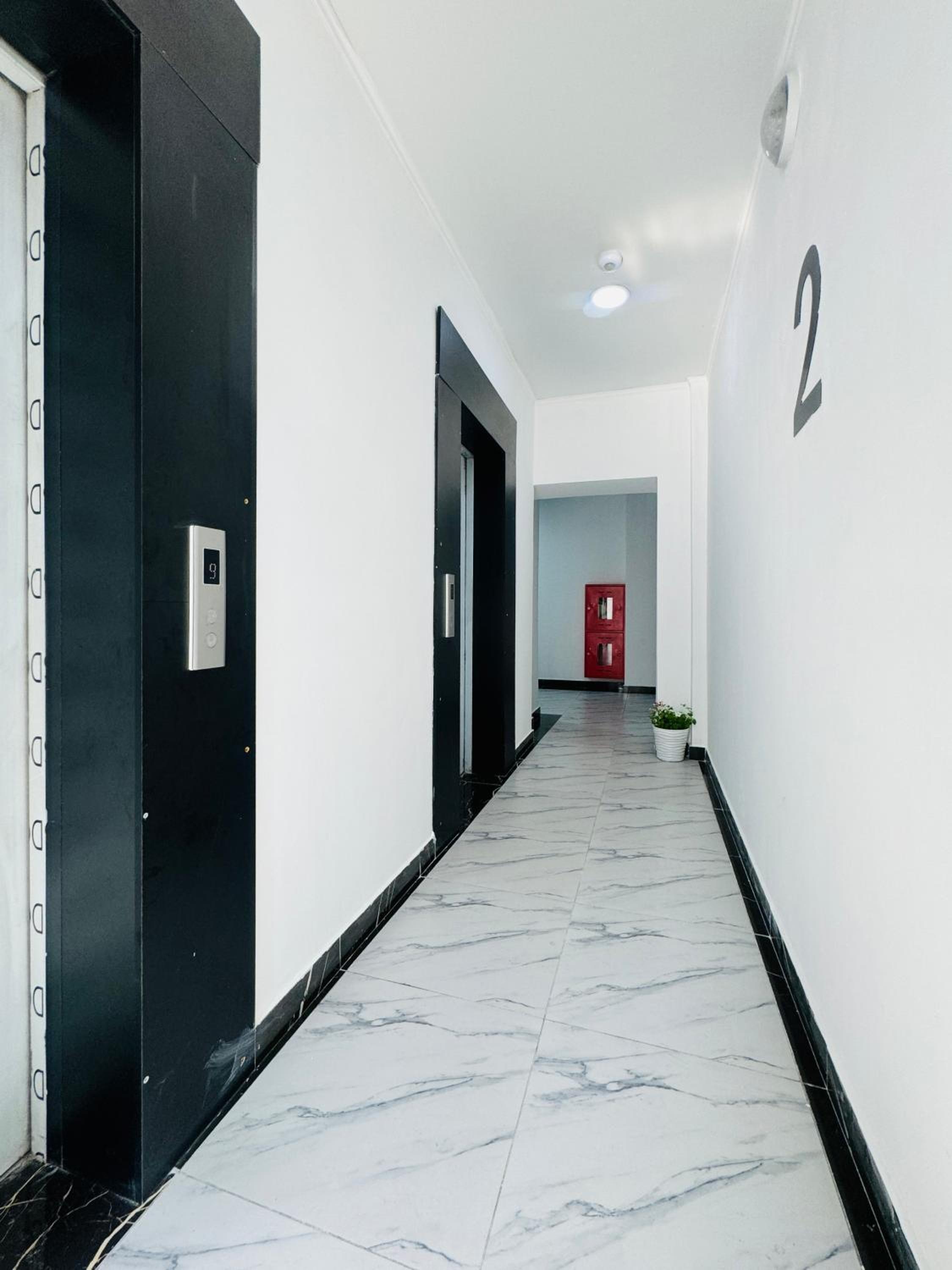 417I1 Gray and Yellow apartment Sholpan city