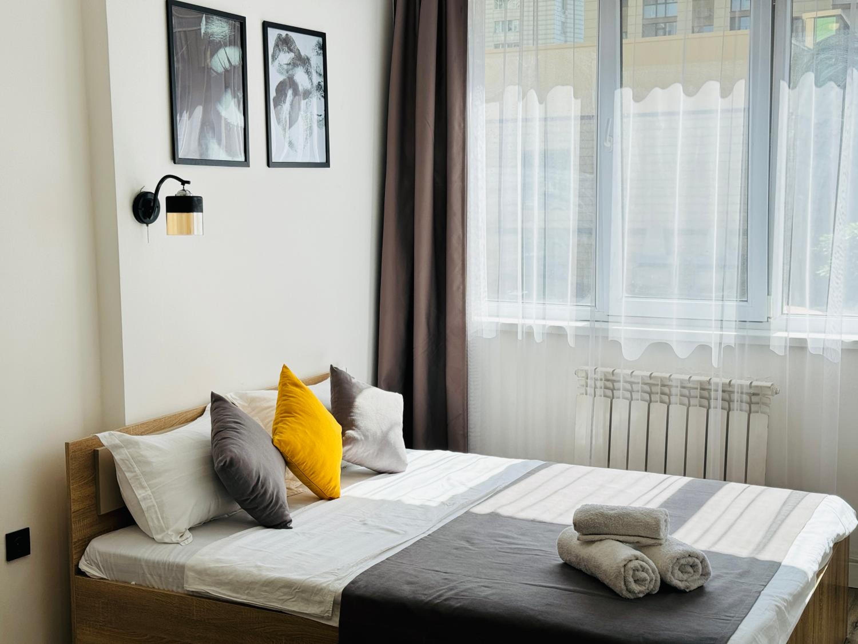417I1 Gray and Yellow apartment Sholpan city