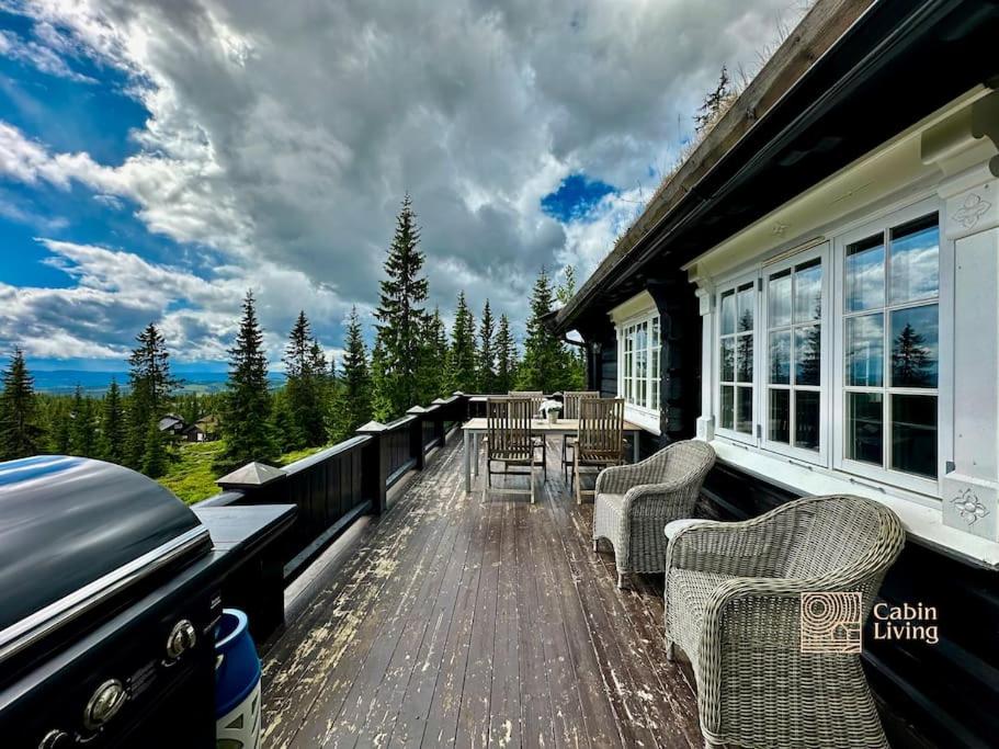 Large log cabin at Sjusjøen with sauna, fireplace and panoramic view view 5