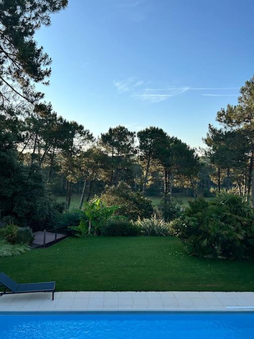 Villa Luxe piscine chauffée, 4 chambres, surplombant le golf entre océan & lac Plage à 5 min