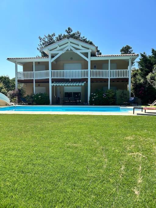 Villa Luxe piscine chauffée, 4 chambres, surplombant le golf entre océan & lac Plage à 5 min