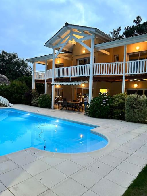 Villa Luxe piscine chauffée, 4 chambres, surplombant le golf entre océan & lac Plage à 5 min