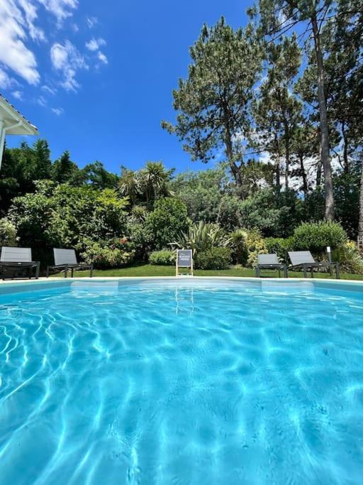 Villa Luxe piscine chauffée, 4 chambres, surplombant le golf entre océan & lac Plage à 5 min
