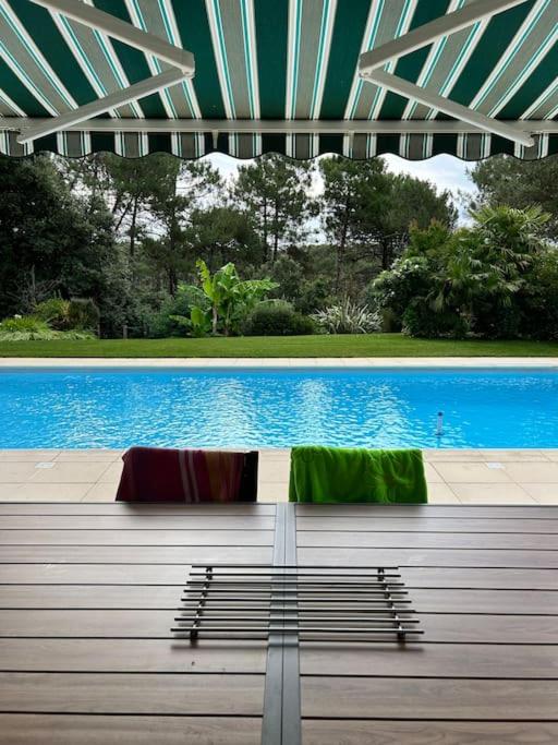 Villa Luxe piscine chauffée, 4 chambres, surplombant le golf entre océan & lac Plage à 5 min