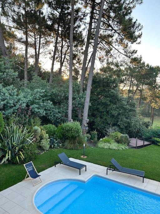Villa Luxe piscine chauffée, 4 chambres, surplombant le golf entre océan & lac Plage à 5 min