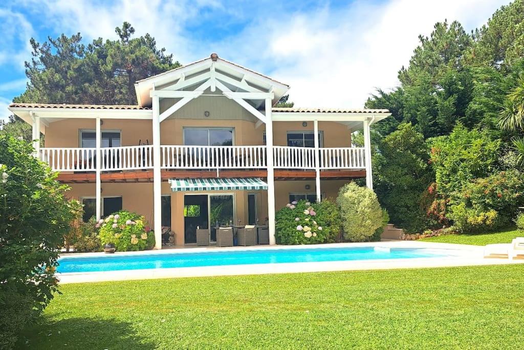 Villa Luxe piscine chauffée, 4 chambres, surplombant le golf entre océan & lac Plage à 5 min