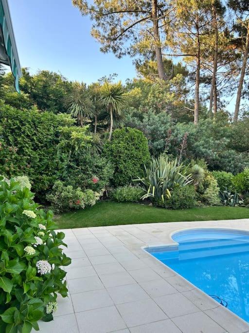 Villa Luxe piscine chauffée, 4 chambres, surplombant le golf entre océan & lac Plage à 5 min