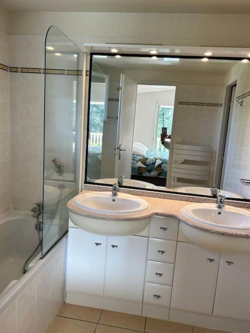 Villa Luxe piscine chauffée, 4 chambres, surplombant le golf entre océan & lac Plage à 5 min