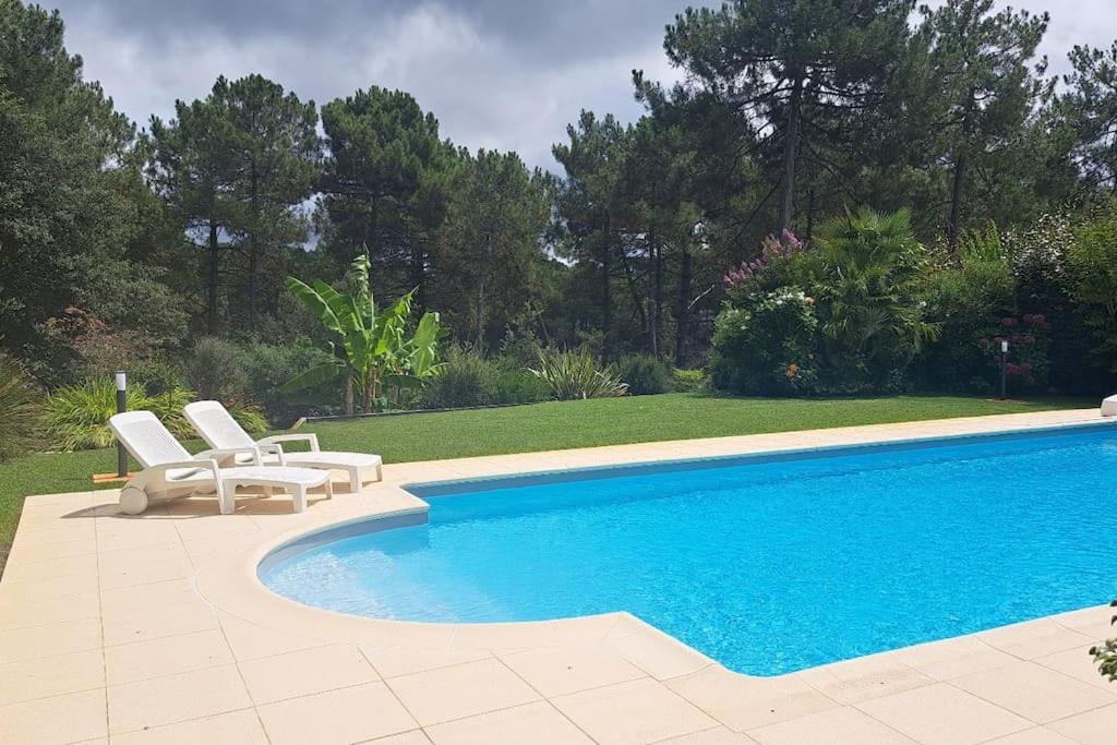 Villa Luxe piscine chauffée, 4 chambres, surplombant le golf entre océan & lac Plage à 5 min