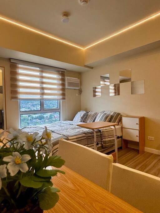 Hotel Homey Place at Avida Riala T4 16TH - Image 1