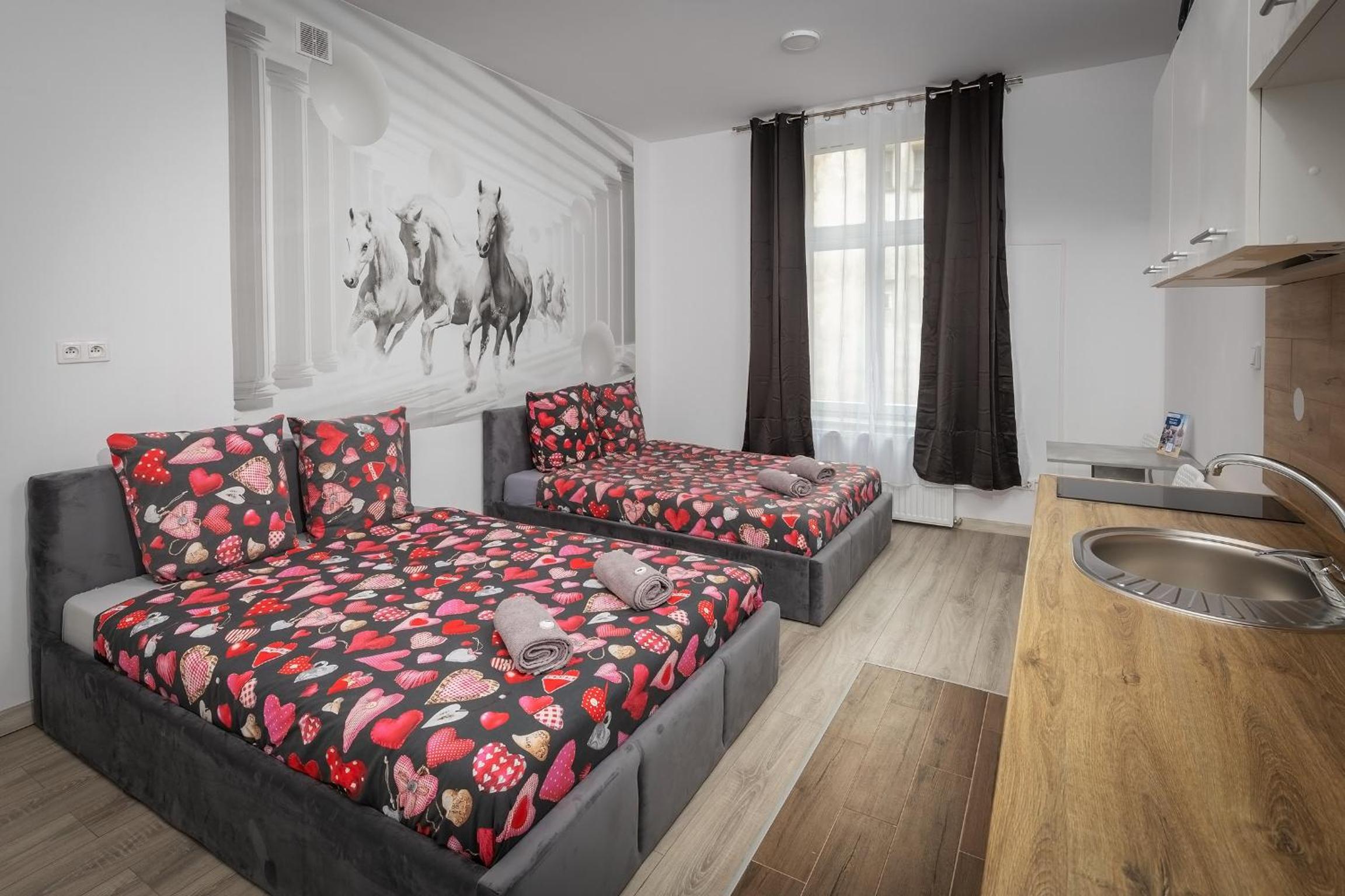 Queen Apartments
