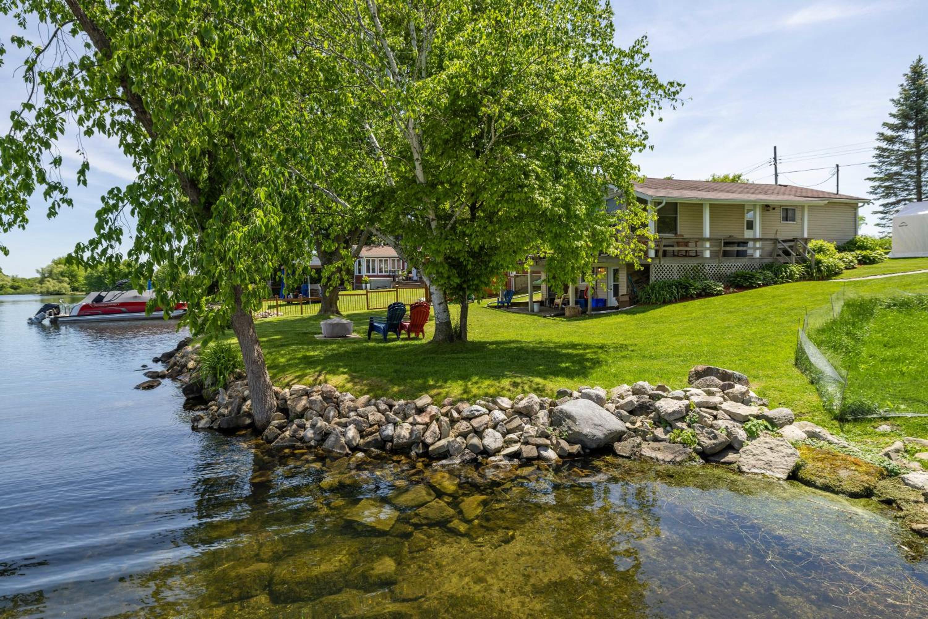 Incredible water view with canoe and kayaks