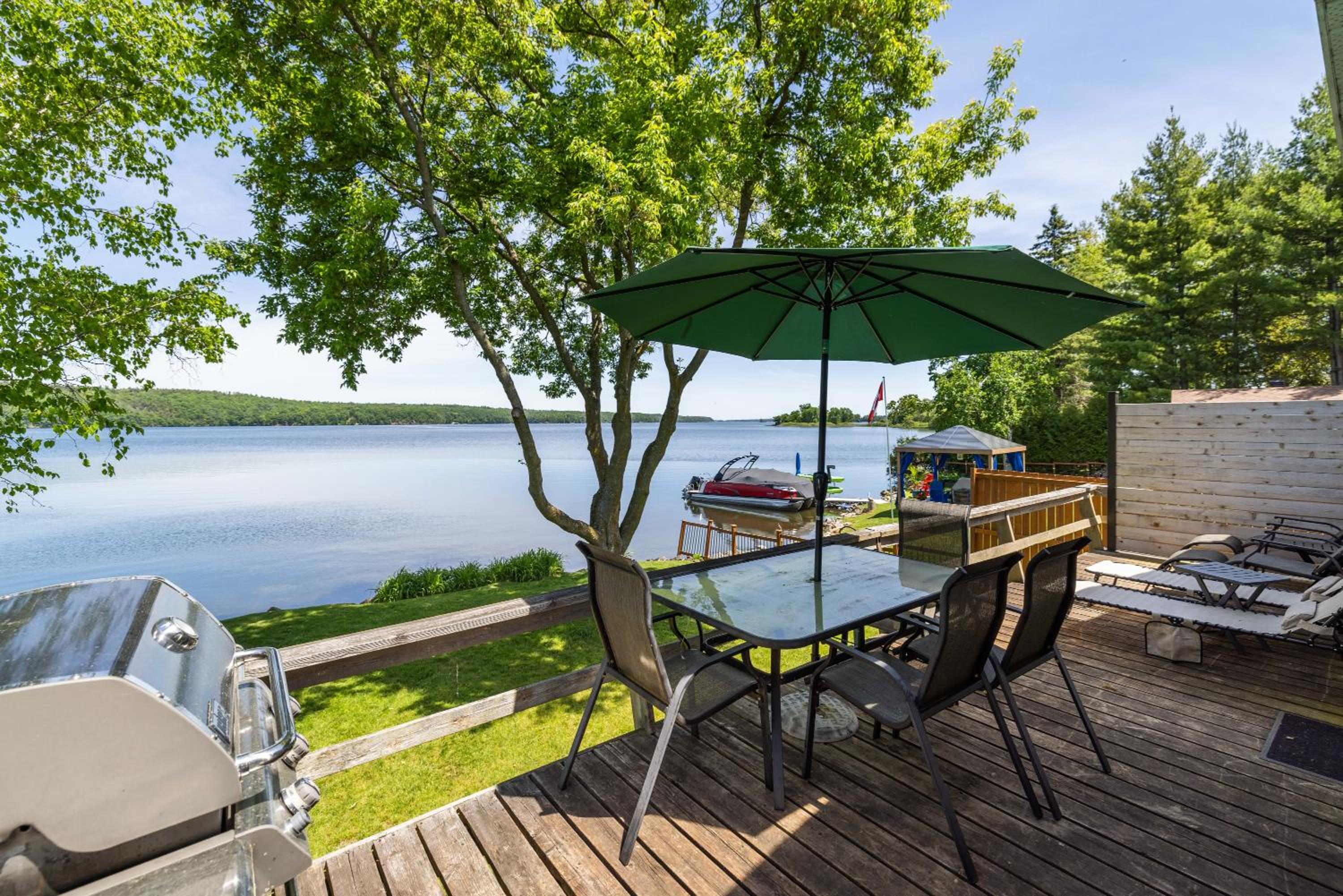 Incredible water view with canoe and kayaks