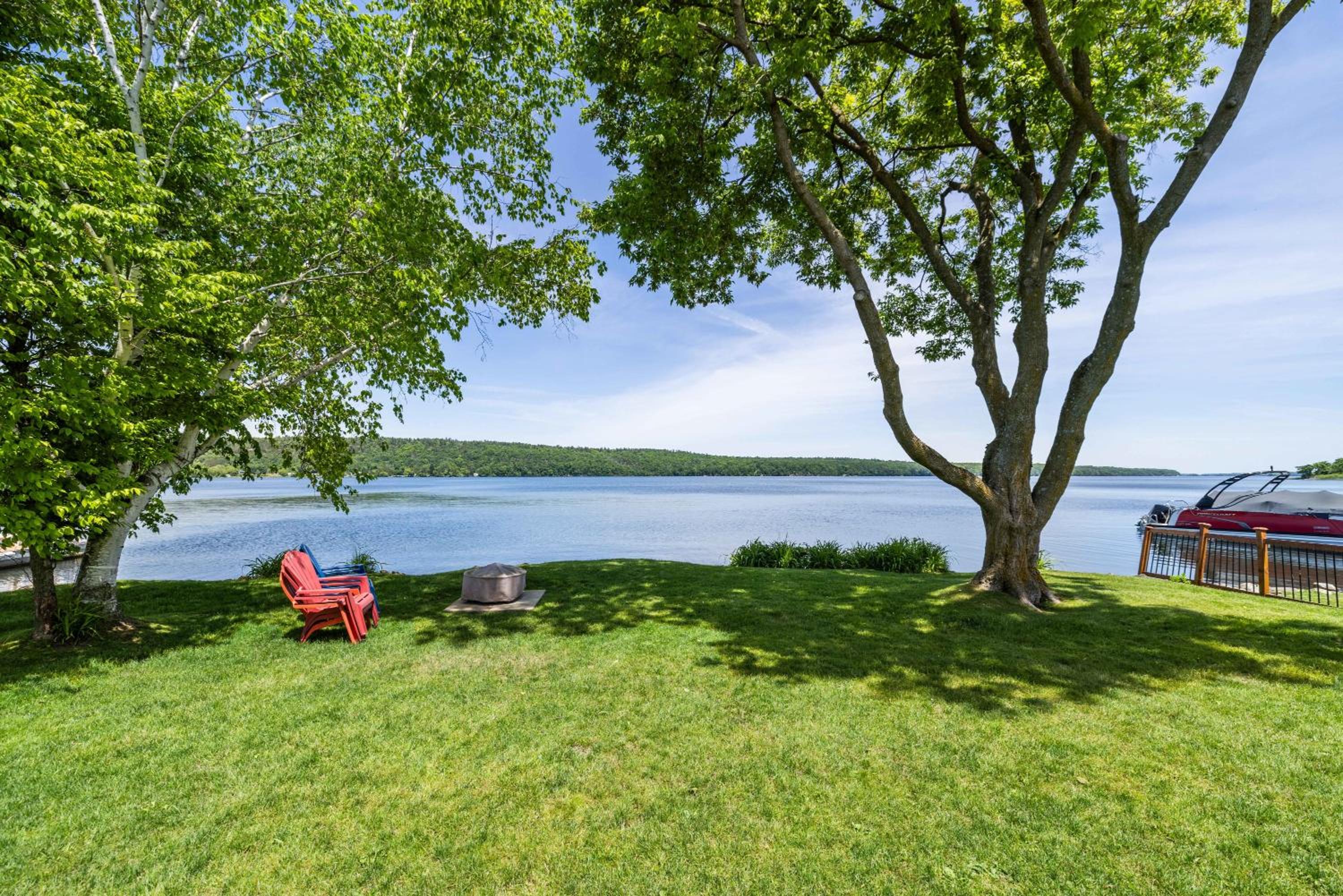 Incredible water view with canoe and kayaks