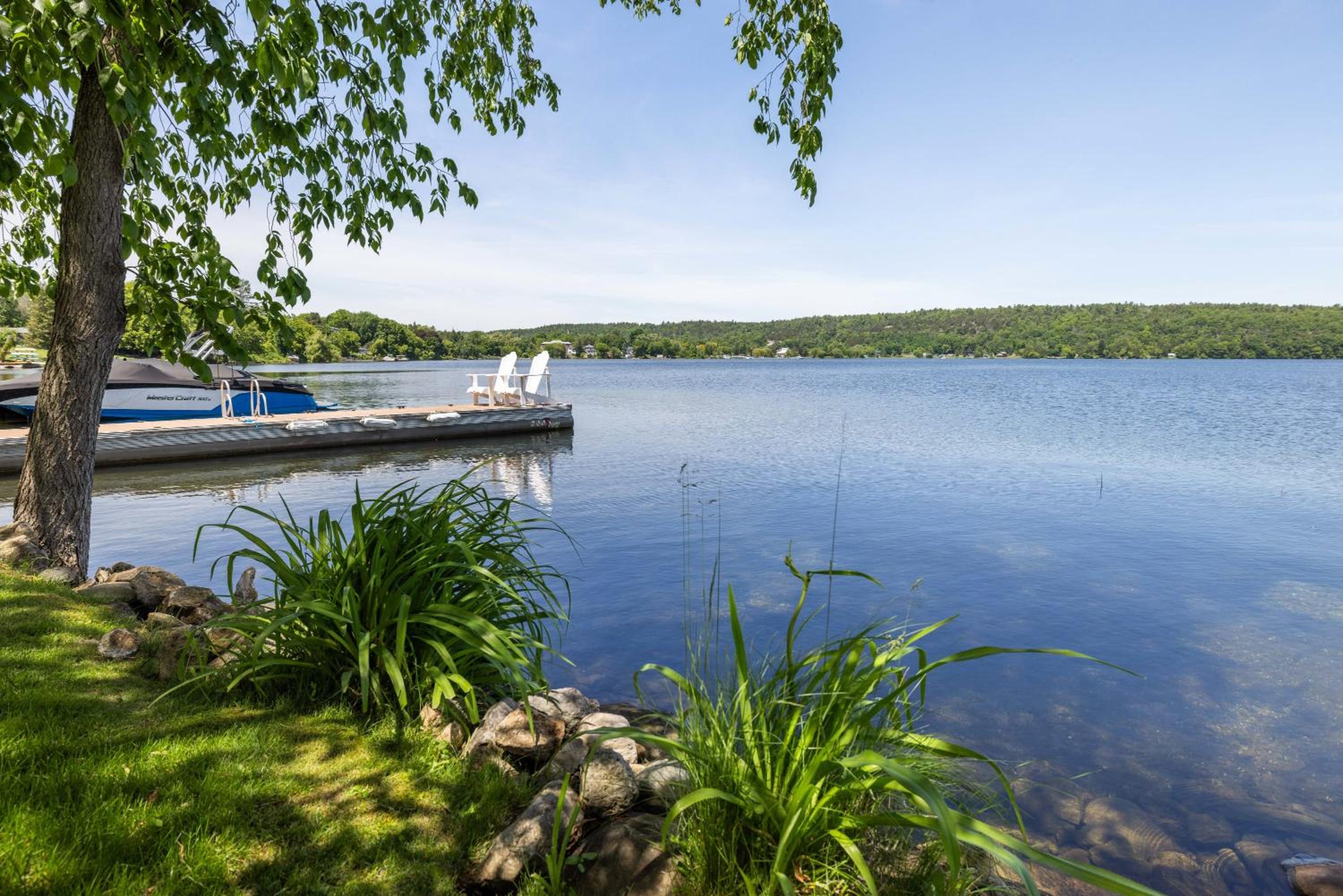 Incredible water view with canoe and kayaks
