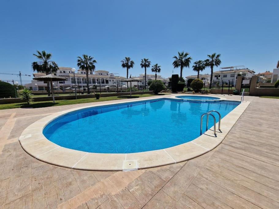Punta Prima Flat with private roof terrace