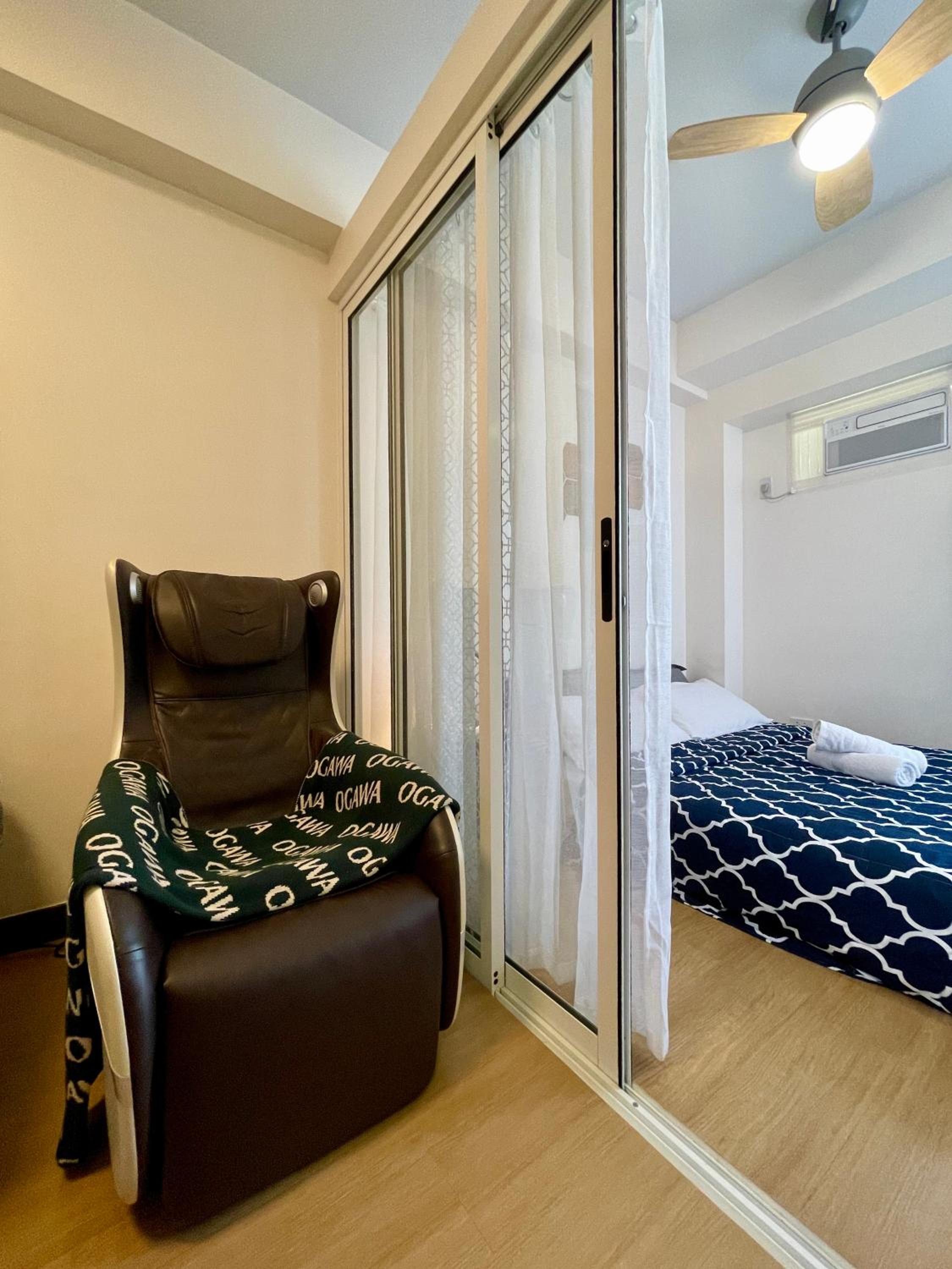 Luxe Pod 211 with Massage Chair & Parking Slot view 2