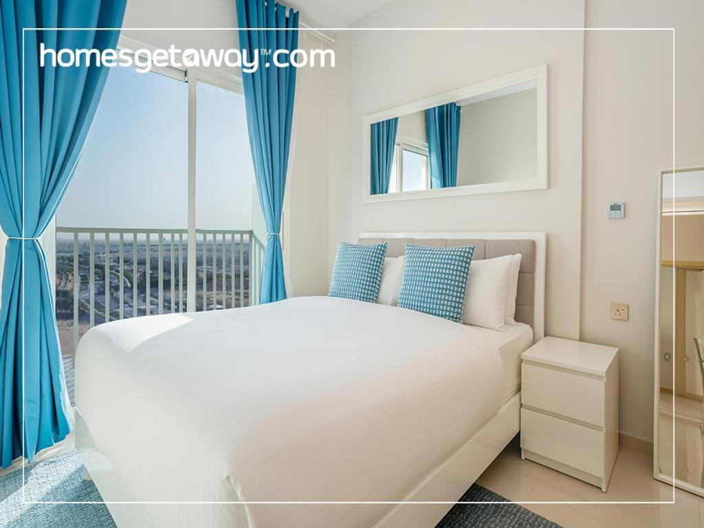 Homesgetaway - Elegant 2BRApt In Navitas A Damac Hills 2