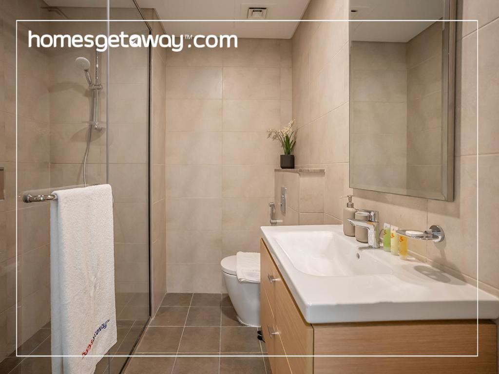 Homesgetaway - Elegant 2BRApt In Navitas A Damac Hills 2