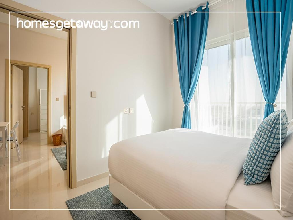 Homesgetaway - Elegant 2BRApt In Navitas A Damac Hills 2
