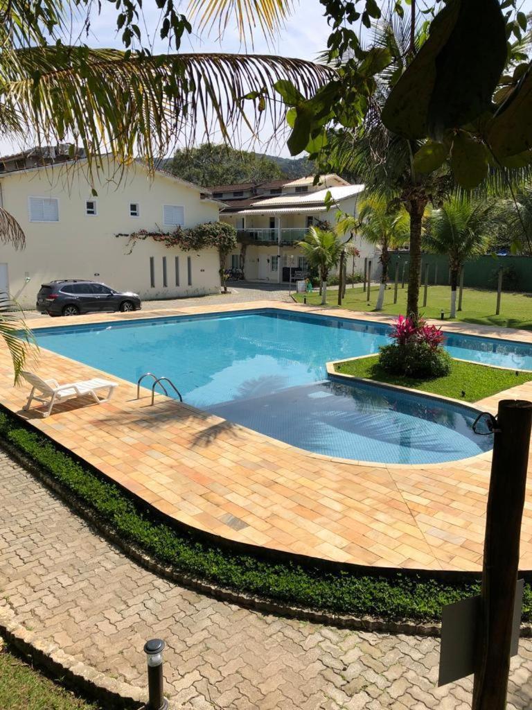 CASA EM CONDOMÍNIO ARBORIZADO PERTO DA PRAIA Confortável e Espaçosa
