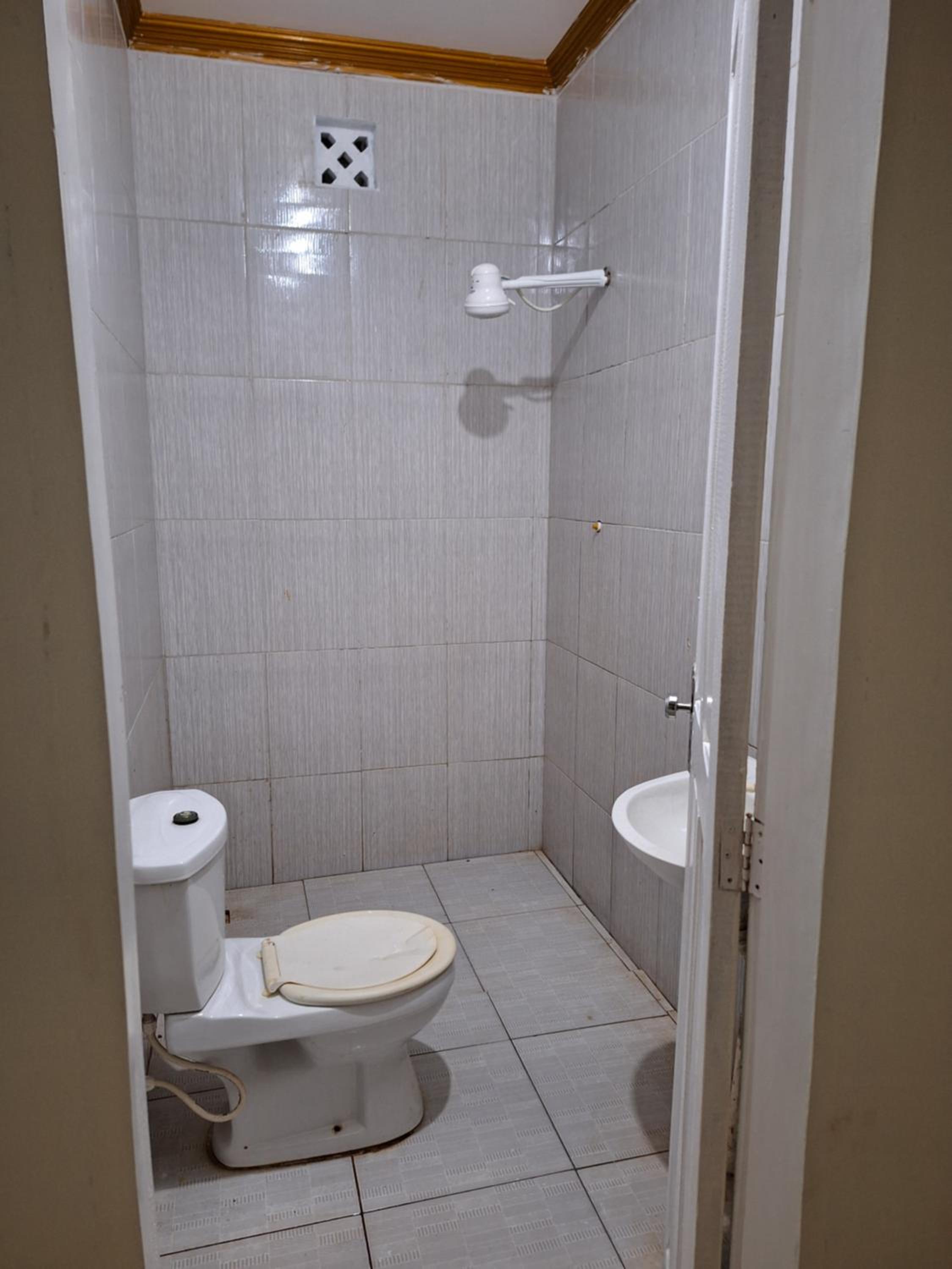 Quarto triplo com banheiro em Pousada e Restaurante