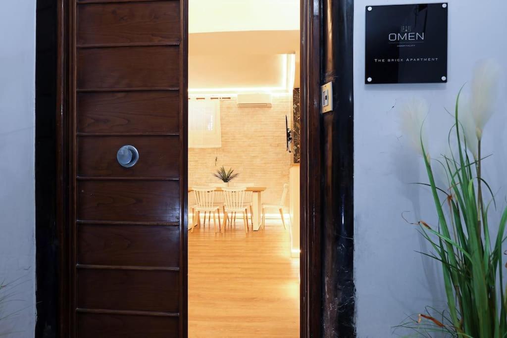The Brick Apartment by Nosdom Properties