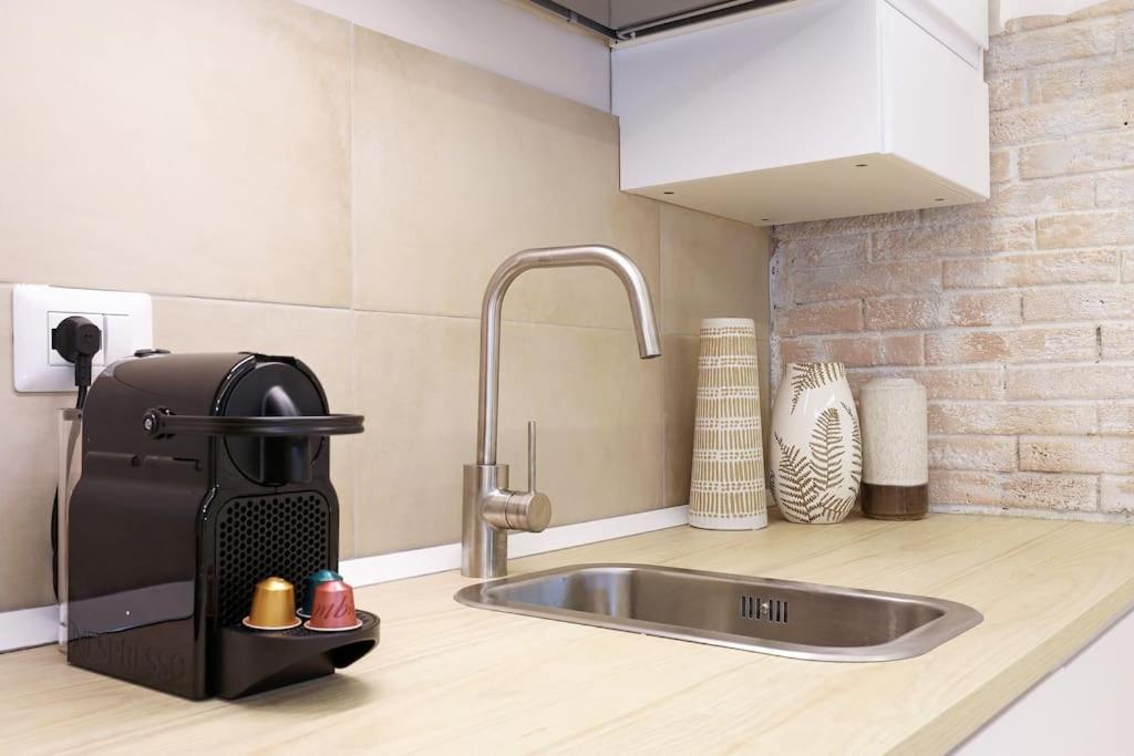 The Brick Apartment by Nosdom Properties