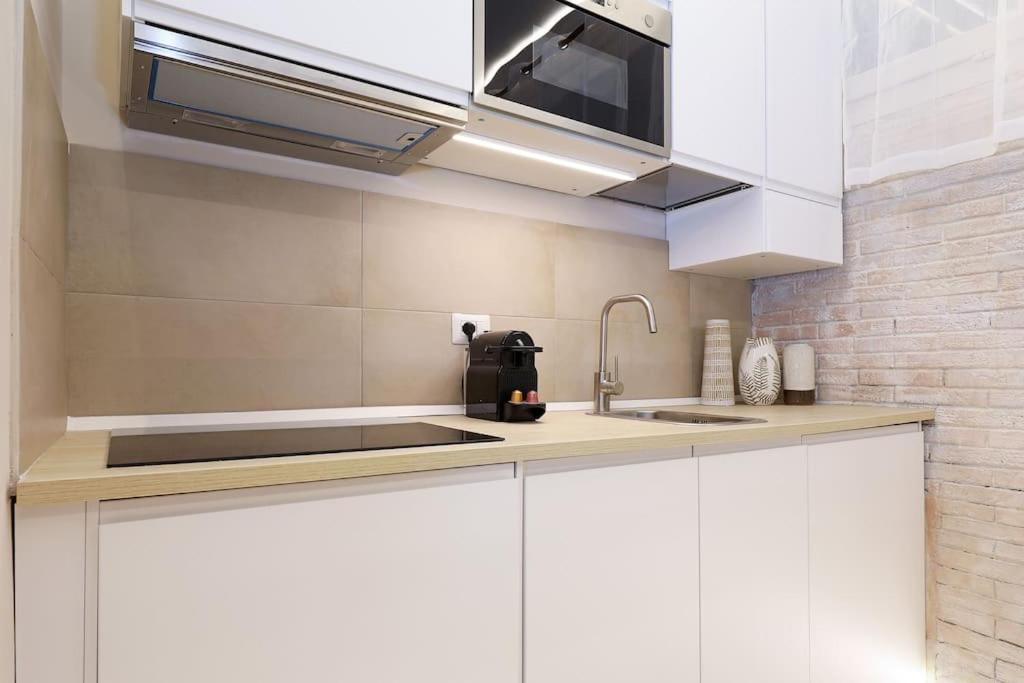 The Brick Apartment by Nosdom Properties